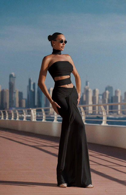 Black event-ready women’s dress styled for a chic outfit, ideal for weddings, cocktail nights, and formal occasions.